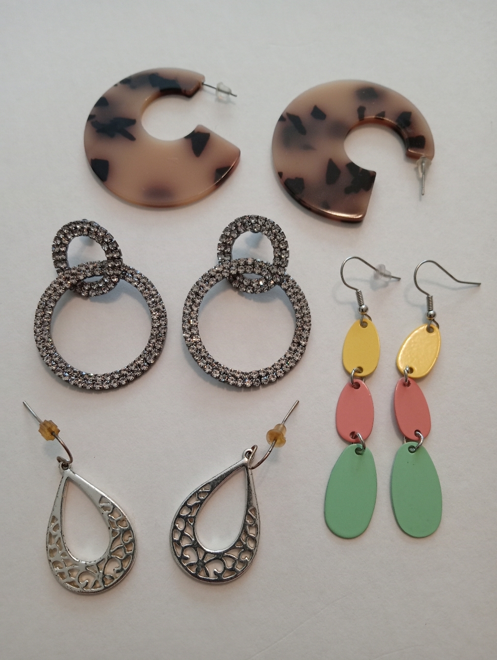 #1185.  4 Piece Assorted, Rhinestone, Silver, Enameled & Acrylic Earring Bundle